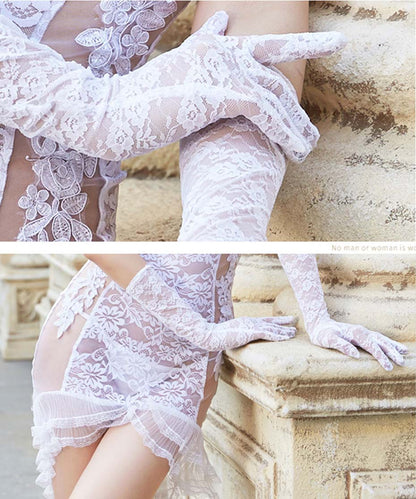 Women's Sensual Wedding Dress - A transparent lace wedding dress embroidered in lace, it includes a dress, panties, bride's veil, and gloves. Perfect for embracing femininity, sensuality, and a lot of personality!
