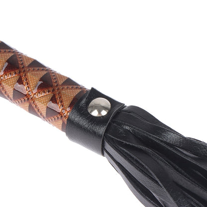 Unleash your inner dominatrix or dominator with our whip. Whether you're a bondage beginner or a seasoned pro, this playful accessory is your ticket to a world of naughty delights. Crafted with a dash of mischief and a sprinkle of excitement, our whip promises to add that extra zing to your intimate moments.