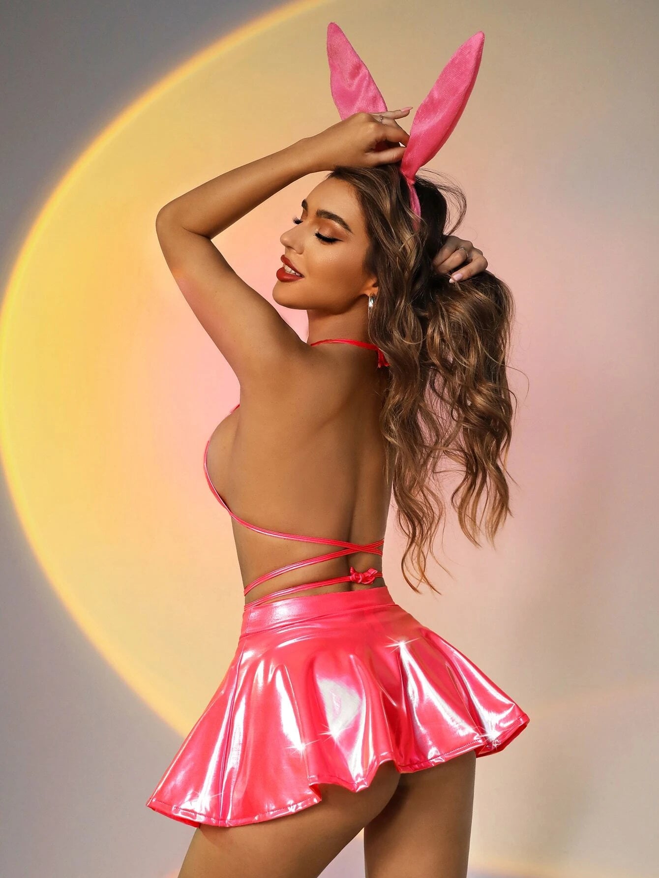 Sexy Bunny Cosplay Costume - This costume includes a pink, stretchy, and comfortable outfit, featuring a charming bunny ear headband. Perfect for playful and seductive moments, whether at parties or for intimate evenings with your partner. Hand wash for easy care. Discreet packaging included. Add excitement to your life with this enchanting bunny costume.